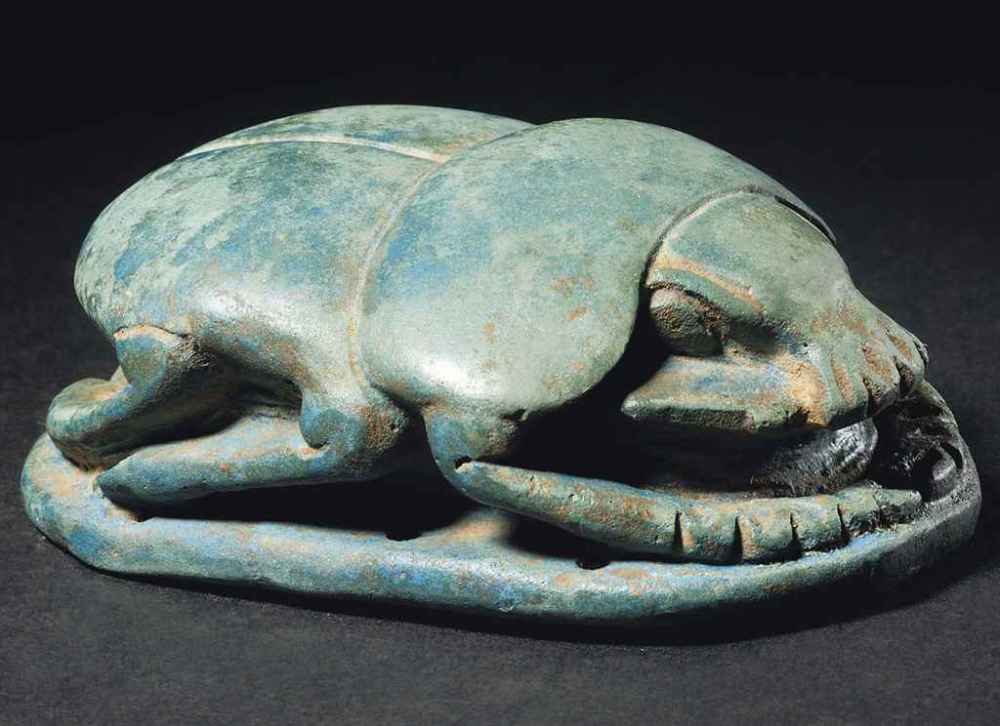 an_egyptian_blue_heart_scarab_late_period_dynasty_xxvi-xxx_circa_664-5_d5609504g